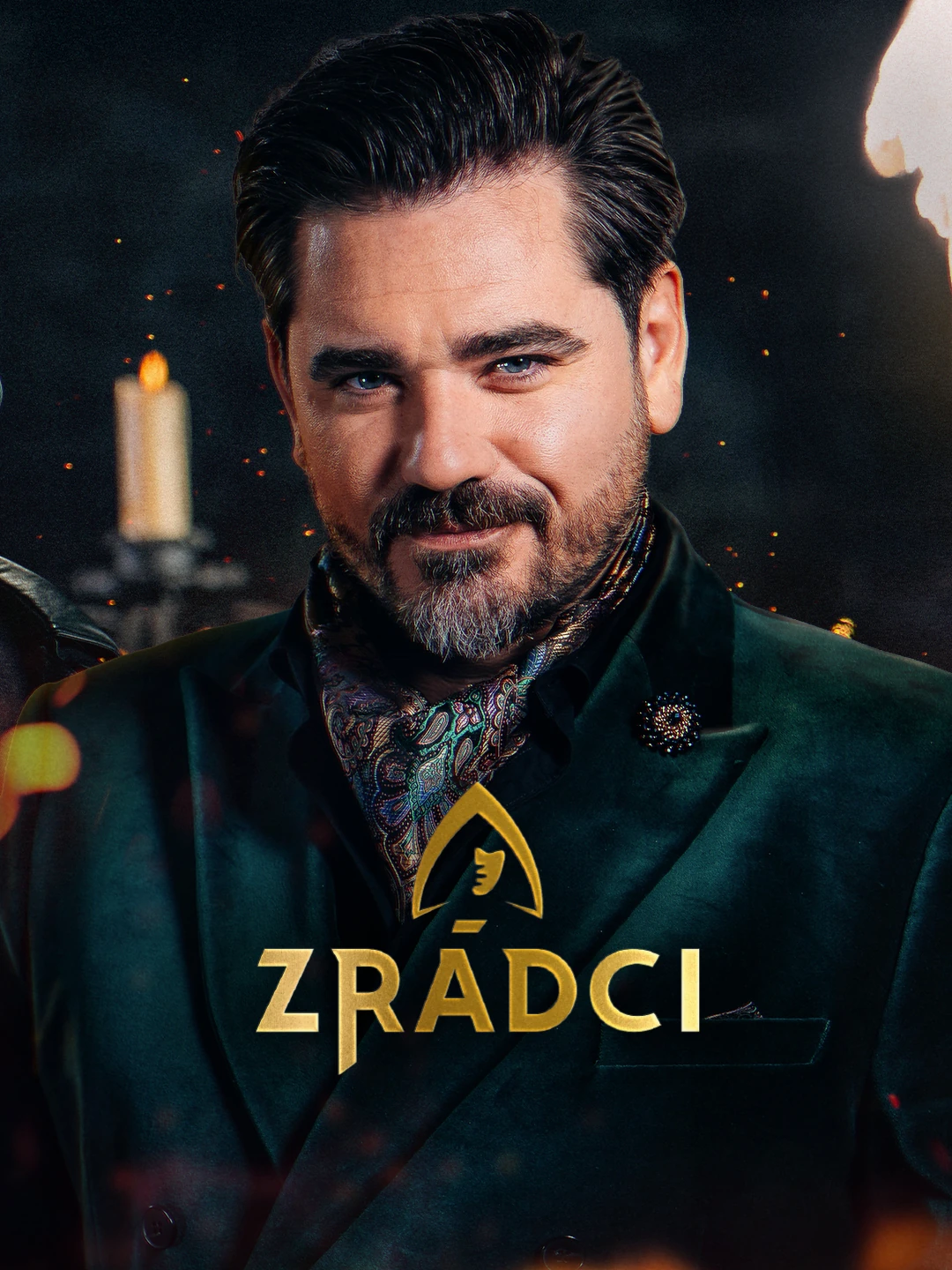 Portrait of the Zrádci host with the show’s gold logo and a candlelit background.